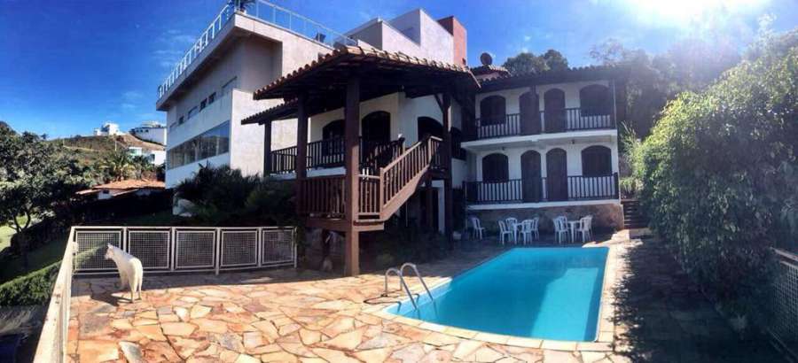 Casa Camaleão Escarpas