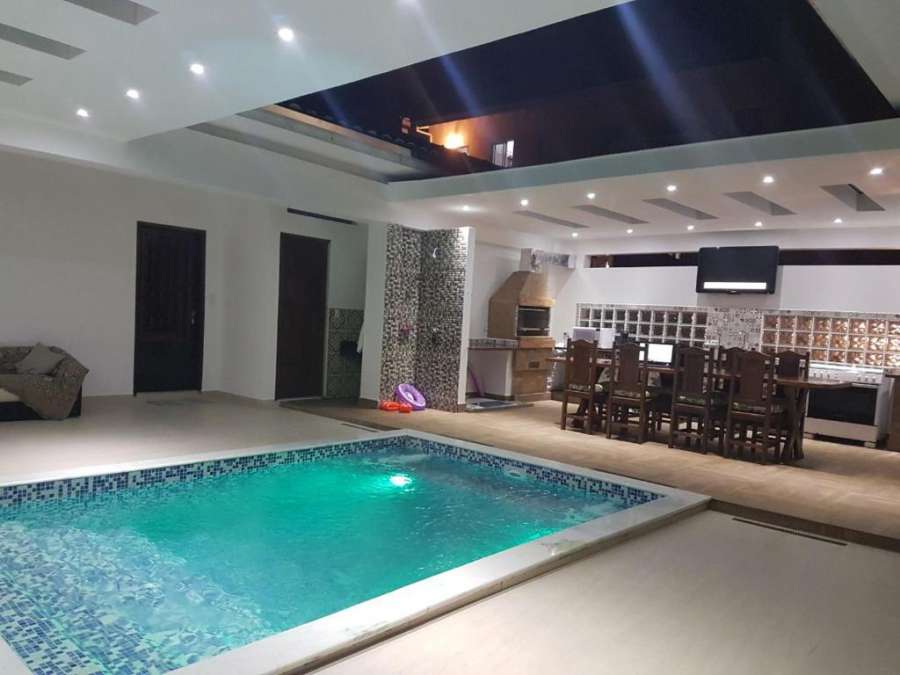 MANSÃO FRENTE A PRAIA - Locação de suítes com área de lazer compartilhada