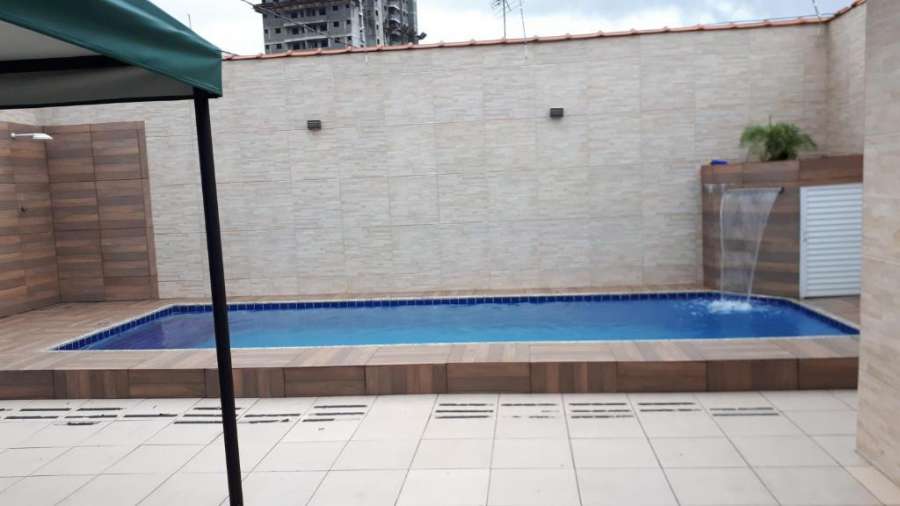 Casa de piscina com churrasqueira