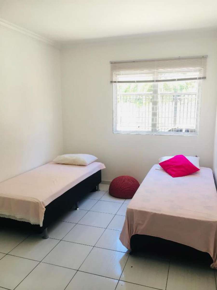Quarto aconchegante a dois passos da praia