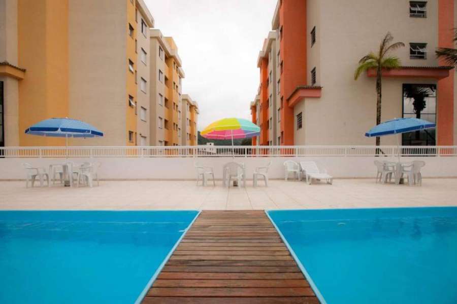 Foto do Sun Way Apartamento com piscina e churrasqueira.