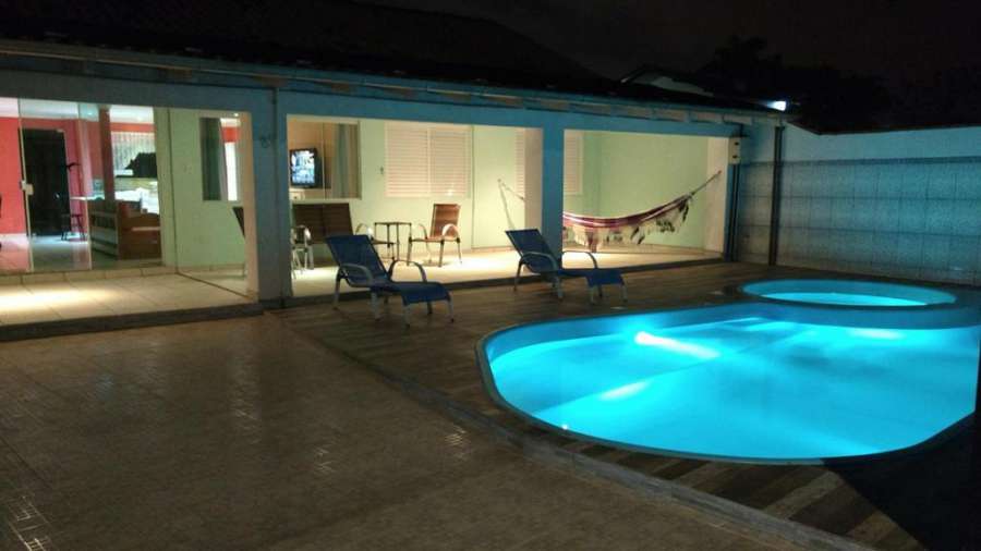 Casa aconchegante com piscina Foto do Casa aconchegante com piscina