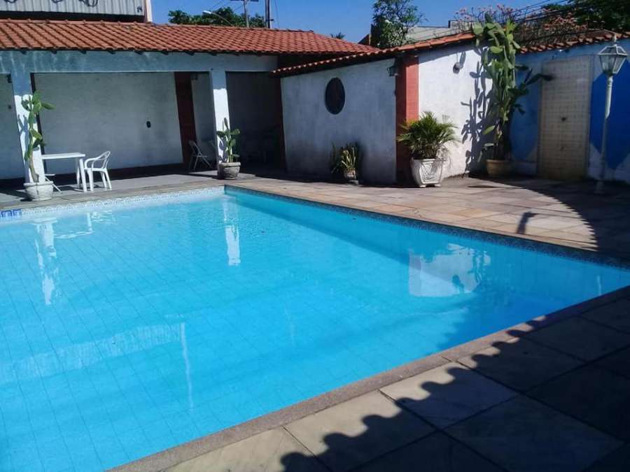 Foto do Casarão com piscina e churrasqueira