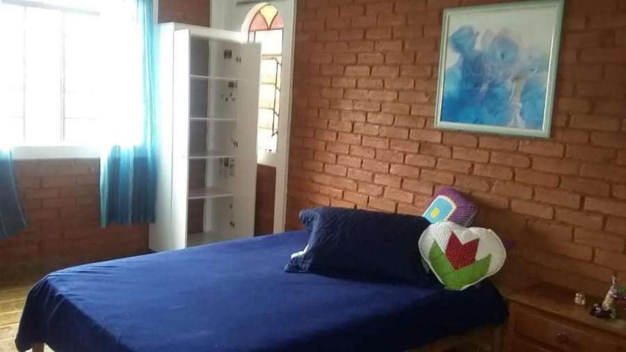 Foto do Quarto Casal em Chalé Colonial no Centro