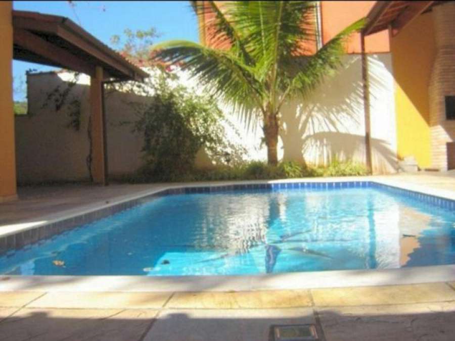 Foto do Casa de praia com piscina e churrasqueira