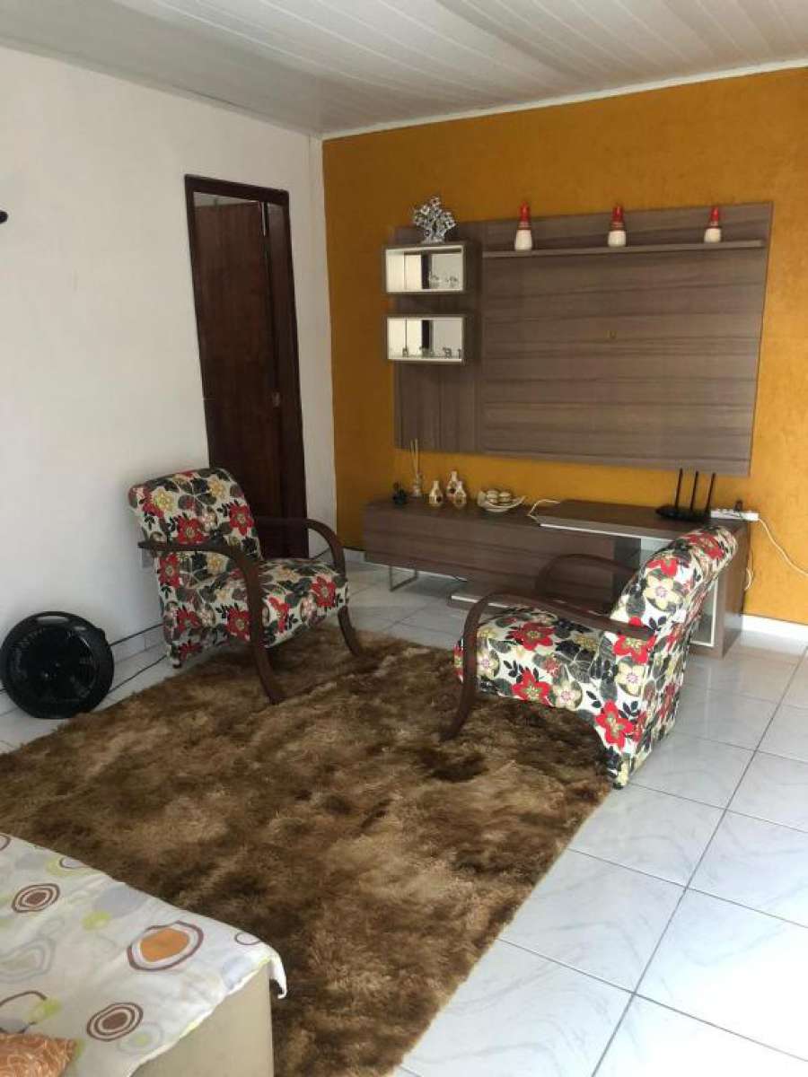 Foto do Casa com churrasqueira e garagem coberta