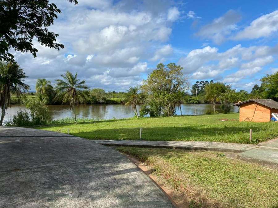 Foto do CASA COM PISCINA EM TORRES beira do rio