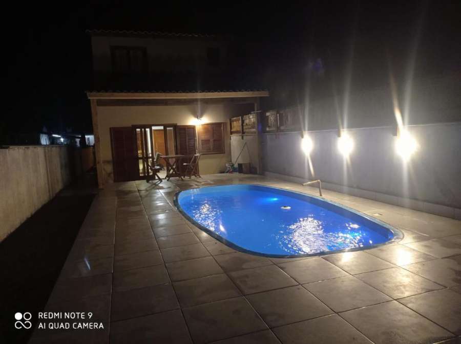 Casa de praia em Garopaba com piscina Foto do Casa de praia em Garopaba com piscina
