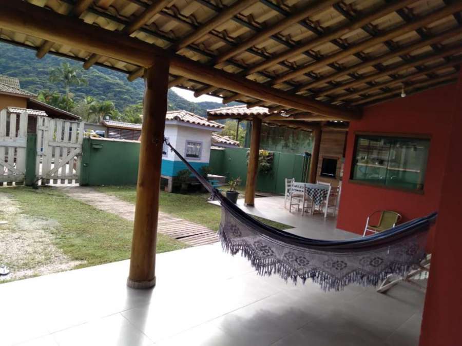 Foto do Casa Praia. Linda varanda para um cochilo na rede