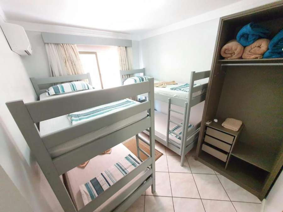 Apartamento a 50 metros do mar com serviço de praia Foto do Apartamento a 50 metros do mar com serviço de praia