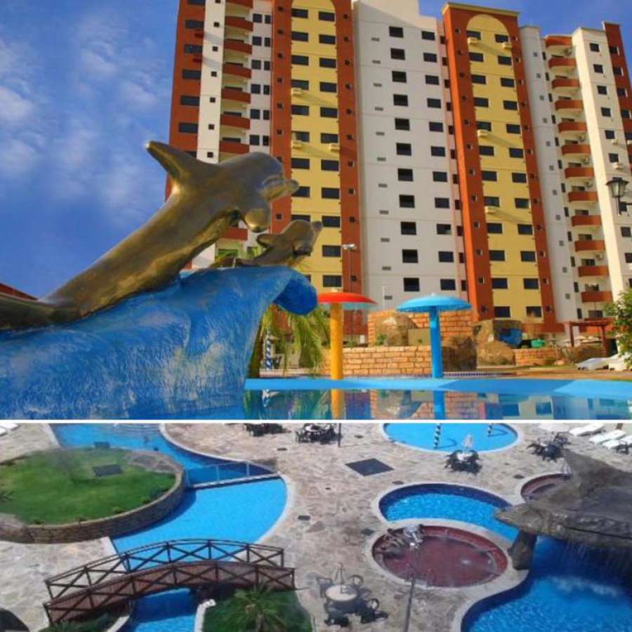 Flat Golden Dolphin Supreme - com Roupas de cama Foto do Flat Golden Dolphin Supreme - com Roupas de cama